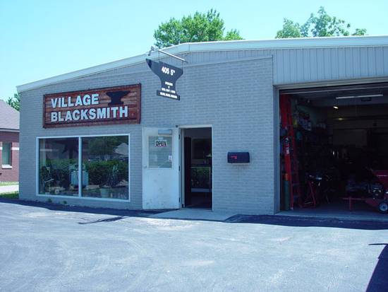 Village Blacksmith exterior with anvil sign